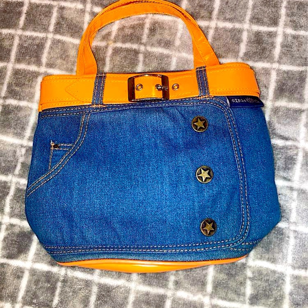Blue denim “skirt” bag with orange “leather” buckle belt. never worn before.